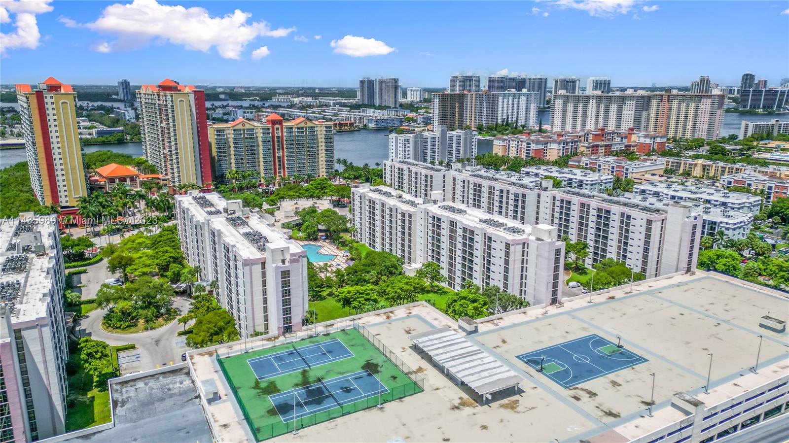 17021 North Bay Road, Unit 418 Sunny Isles Beach, FL 33160 - Photo 43 of 43 a view of a street with a bench in front of it