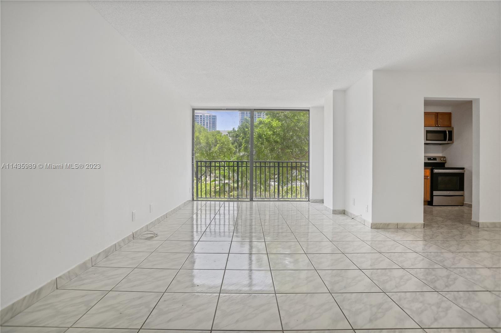 17021 North Bay Road, Unit 418 Sunny Isles Beach, FL 33160 - Photo 6 of 43 a view of an empty room with a window