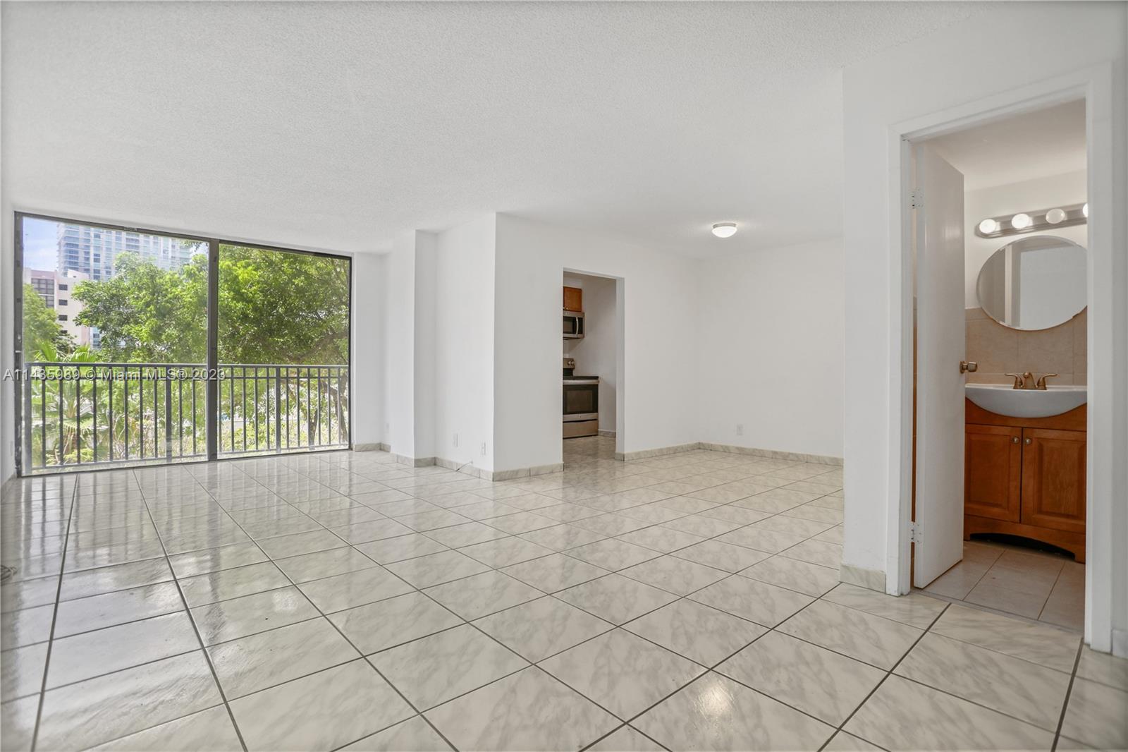 17021 North Bay Road, Unit 418 Sunny Isles Beach, FL 33160 - Photo 8 of 43 a view of an empty room with a window