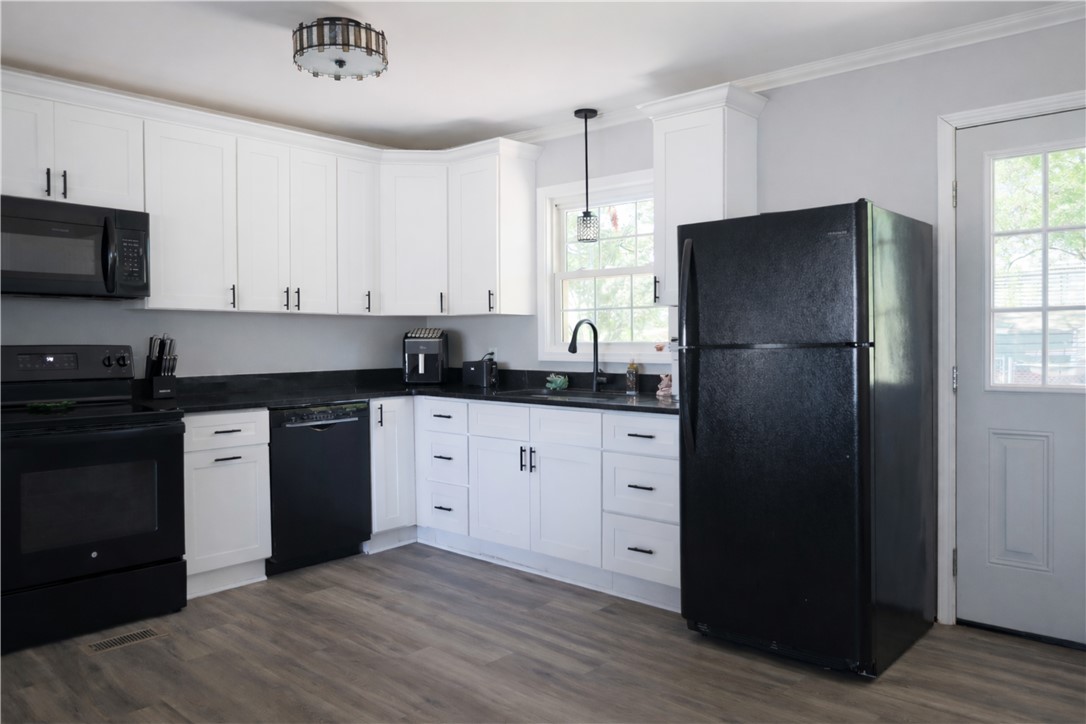 9432 Highway 81 Iva, SC 29655 - Photo 7 of 19 This thoughtfully designed kitchen features a full suite of appliances and ample cabinetry.