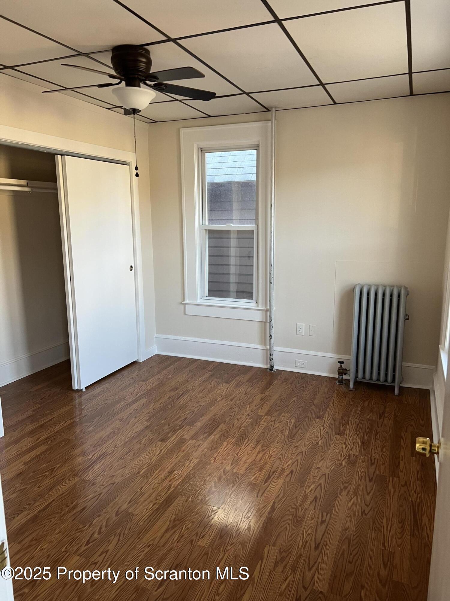 1330 Pittston Avenue, Unit 2N Scranton, PA 18505 - Photo 11 of 12 a view of an empty room with a window