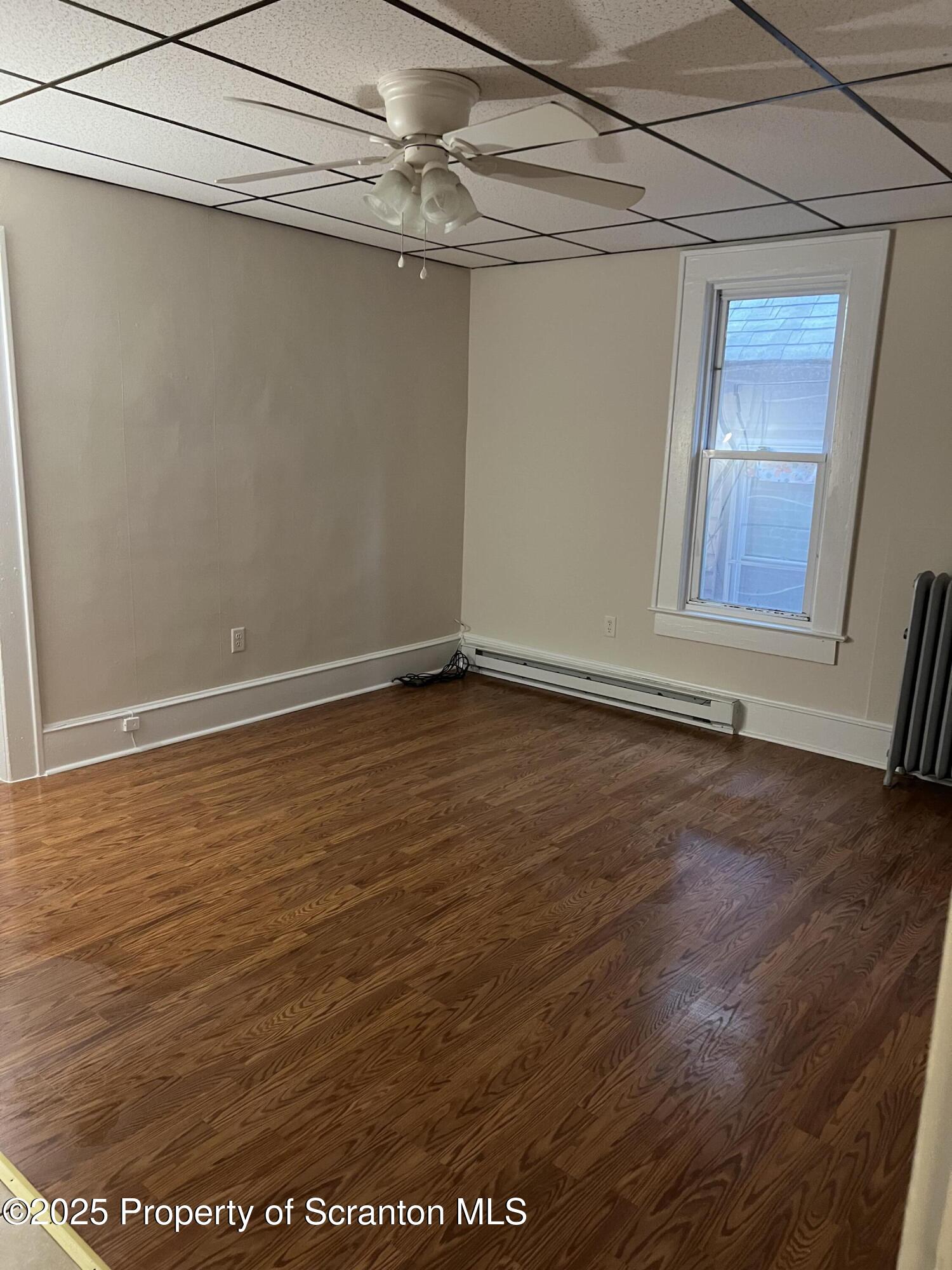 1330 Pittston Avenue, Unit 2N Scranton, PA 18505 - Photo 5 of 12 a view of an empty room with a window