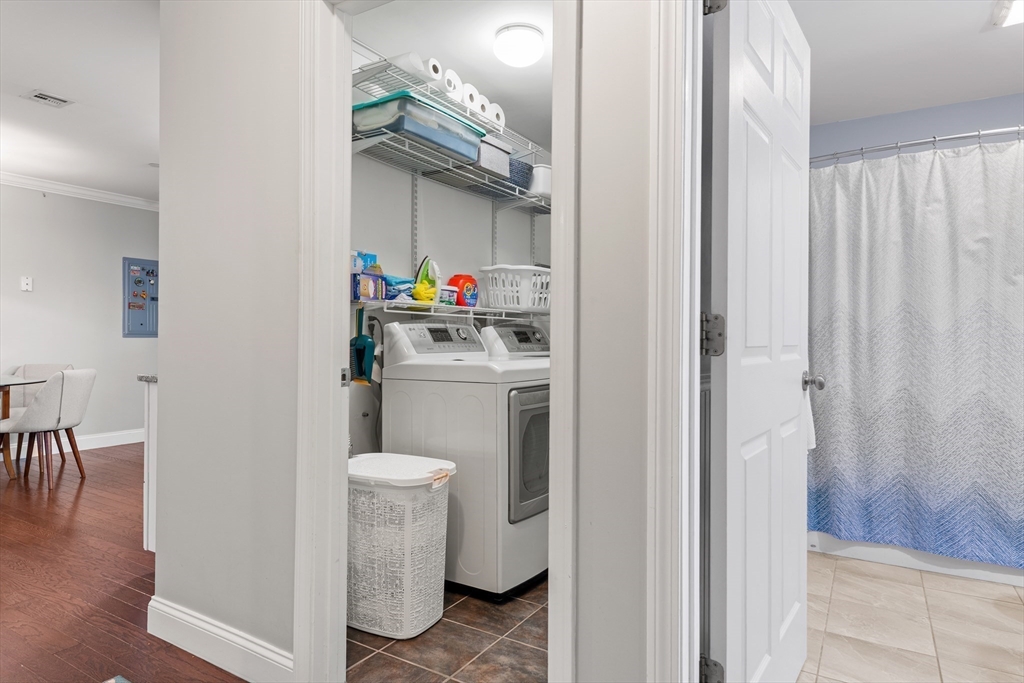 24 Shayne Road, Unit 219 Franklin, MA 02038 - Photo 18 of 23 a room with a washer and dryer