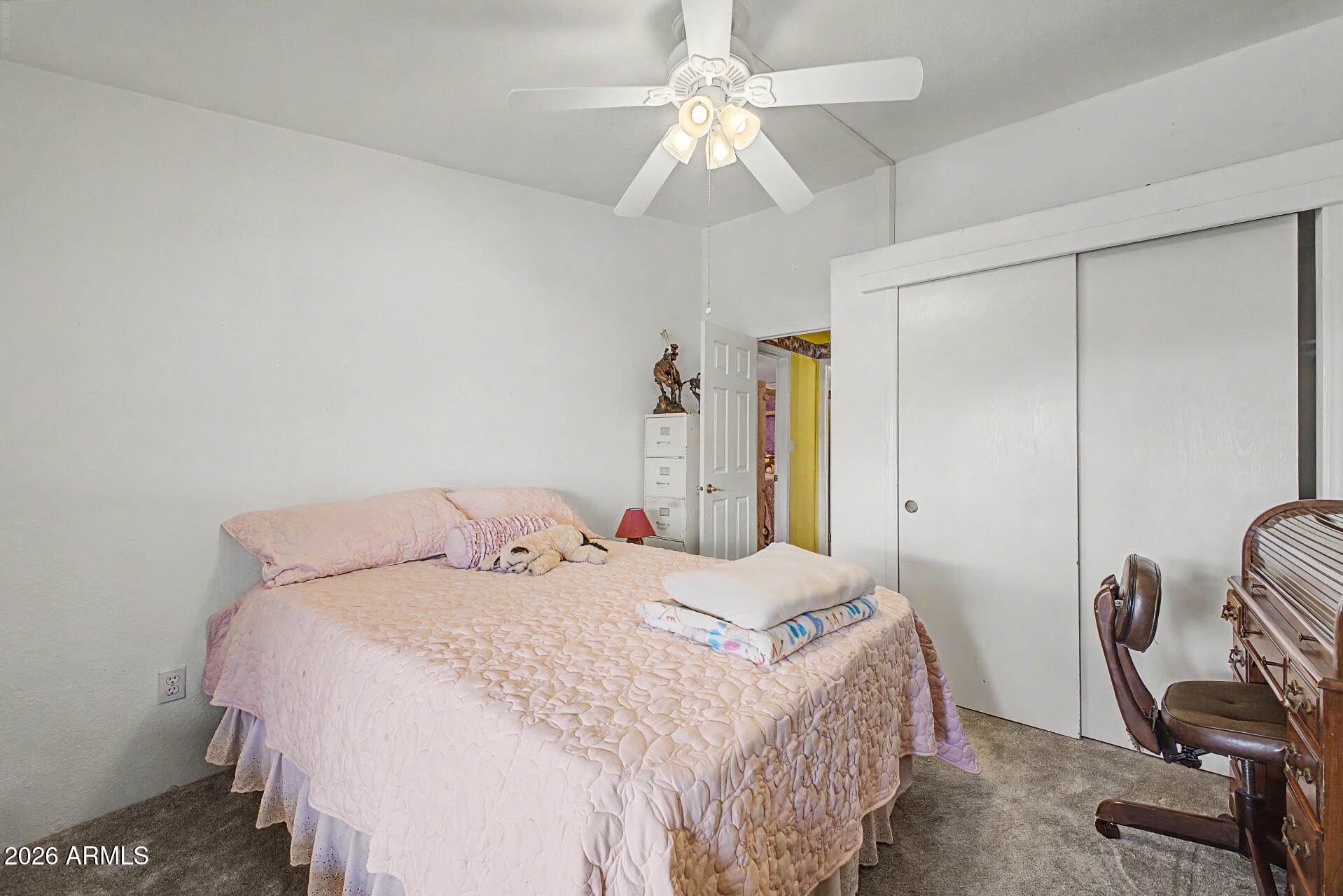 2548 South Val Vista Road Apache Junction, AZ 85119 - Photo 26 of 29 a bedroom with a bed a desk and chair