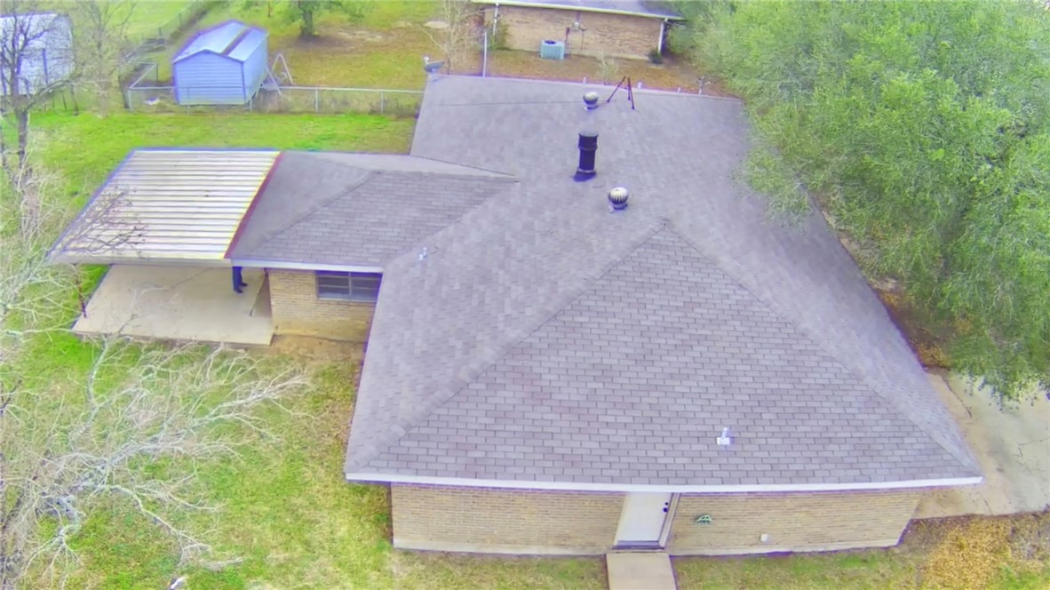 3840 Mancuso Road Bryan, TX 77808 - Photo 30 of 31 an aerial view of a house with a yard