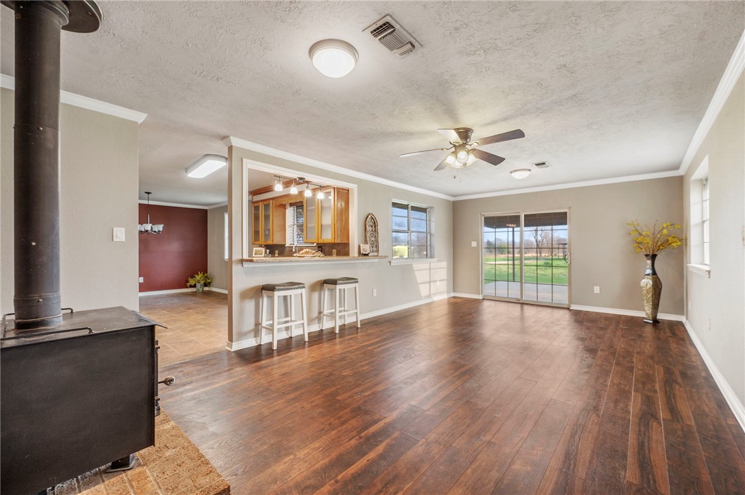 3840 Mancuso Road Bryan, TX 77808 - Photo 3 of 31 a view of livingroom with hardwood floor and ceiling fan