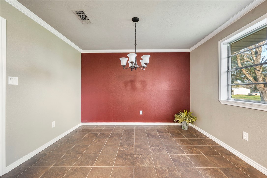 3840 Mancuso Road Bryan, TX 77808 - Photo 9 of 31 a view of a livingroom with a window