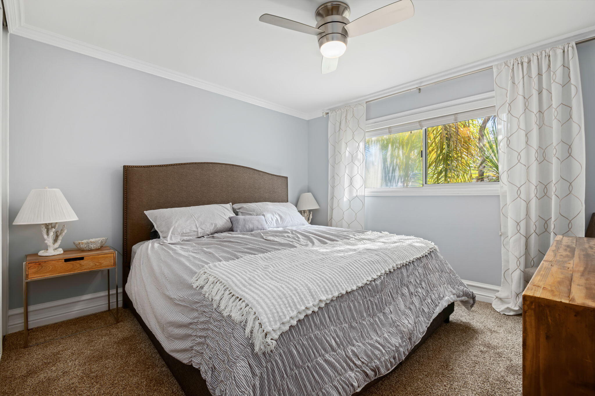 4880 Sandyland Road, Unit 48 Carpinteria, CA 93013 - Photo 12 of 29 a bedroom with bed and window