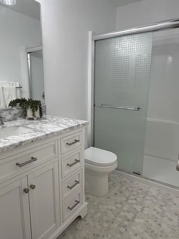 a view of a backyard with plants