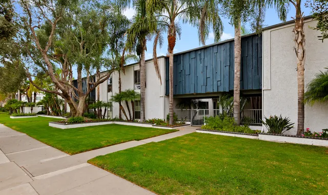a view of a swimming pool with an outdoor seating