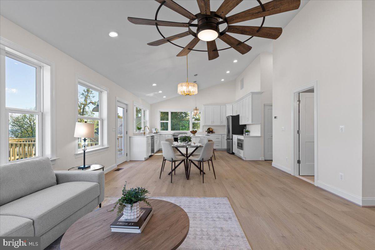 2825 Ridge Road Huntingtown, MD 20639 - Photo 65 of 67 a living room with furniture and a large window