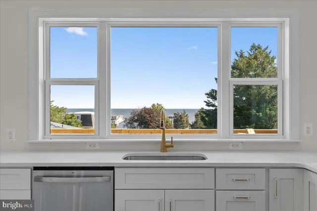 a kitchen with a sink and a window