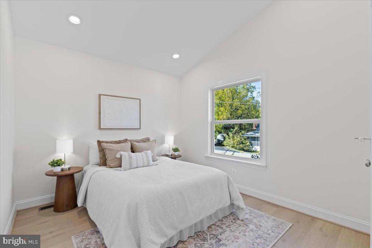 2825 Ridge Road Huntingtown, MD 20639 - Photo 23 of 66 a bedroom with a bed and a window