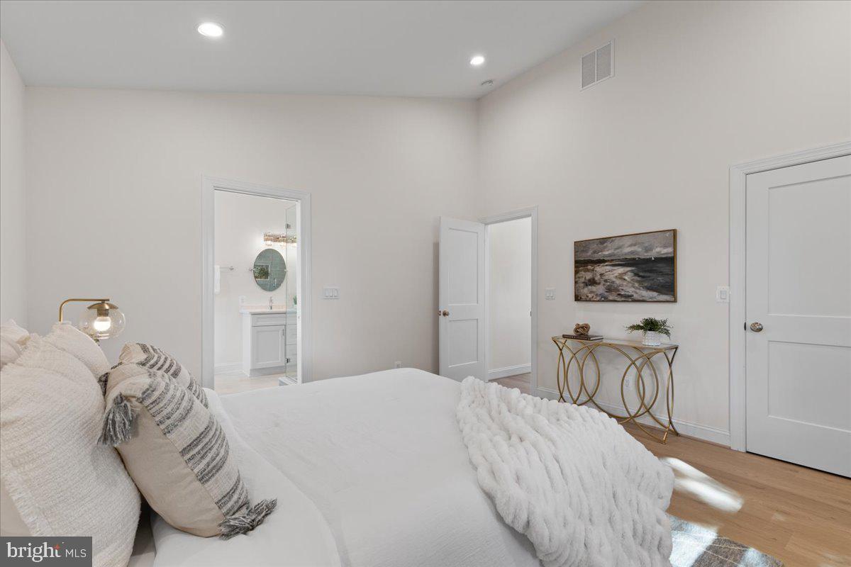 2825 Ridge Road Huntingtown, MD 20639 - Photo 29 of 66 a bedroom with a bed and chair