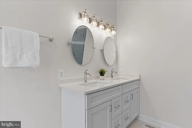 a view of a wooden deck and a yard