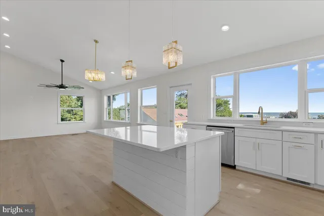a bathroom with a sink a toilet and a bathtub