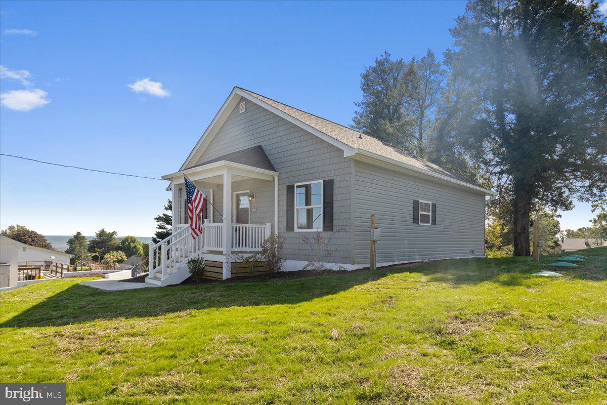 2825 Ridge Road Huntingtown, MD 20639 - Photo 46 of 66 a view of a house with a yard and swimming pool