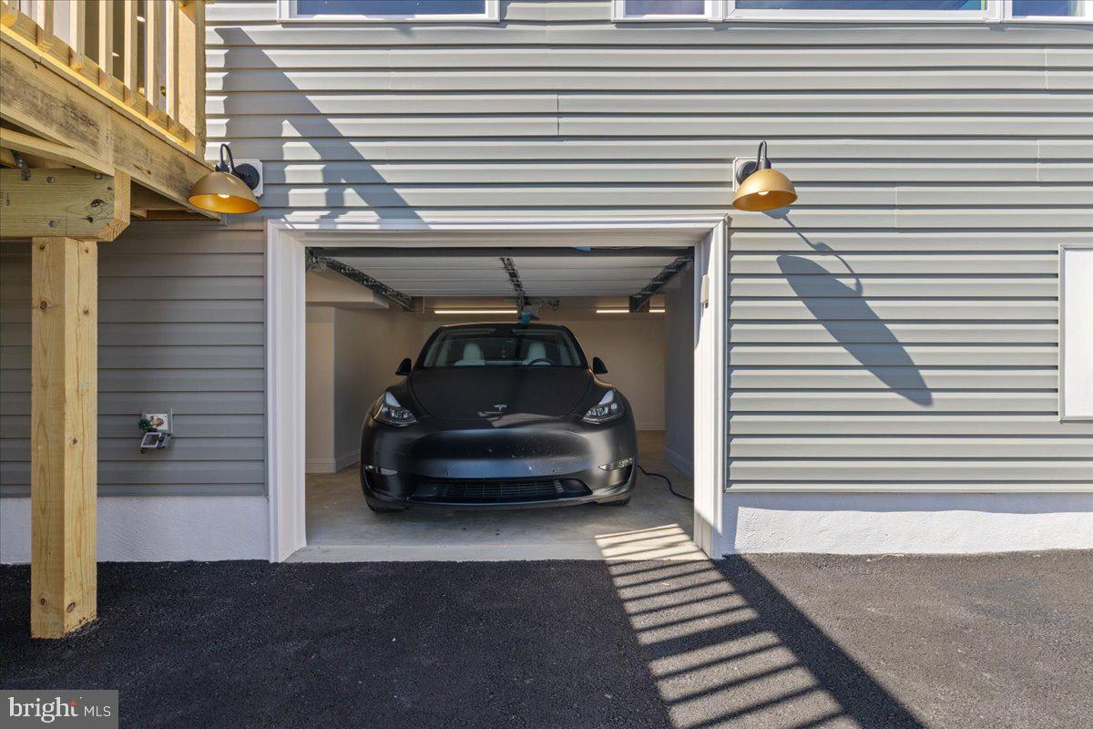 2825 Ridge Road Huntingtown, MD 20639 - Photo 50 of 67 a car parked in front of a house