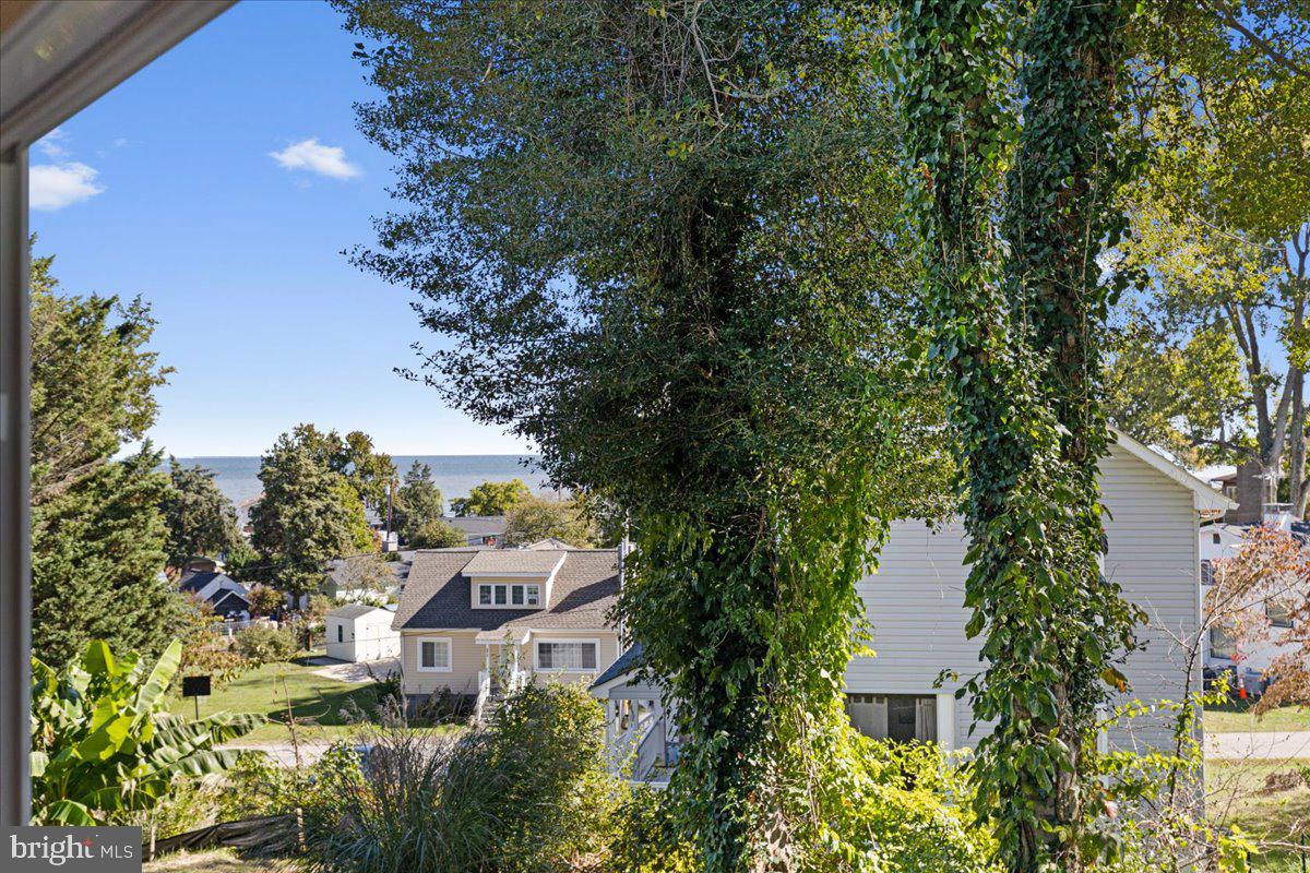 2825 Ridge Road Huntingtown, MD 20639 - Photo 61 of 66 an aerial view of a house with swimming pool and garden space