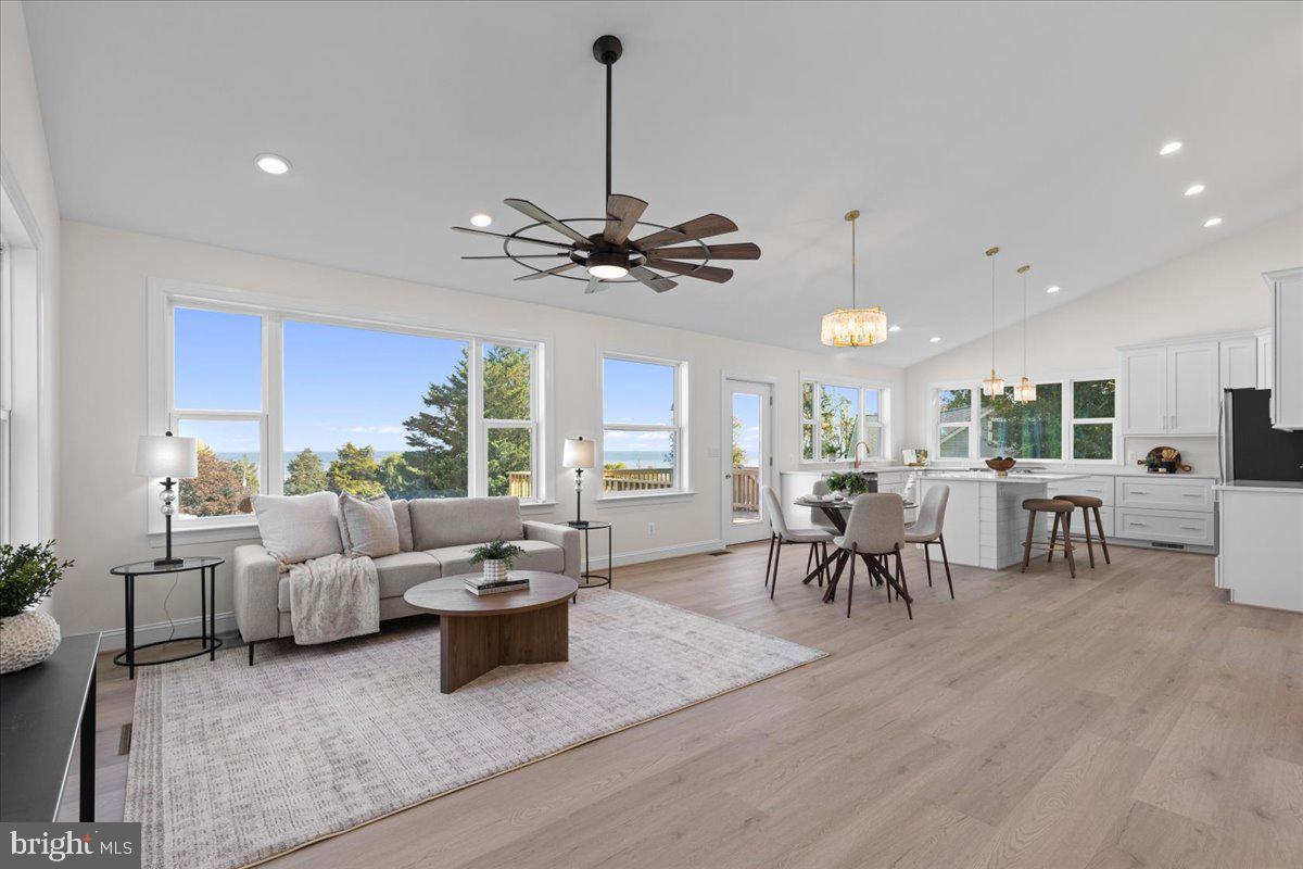 2825 Ridge Road Huntingtown, MD 20639 - Photo 8 of 67 a living room with furniture and a large window