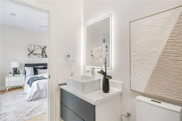 a bathroom with a shower and a toilet