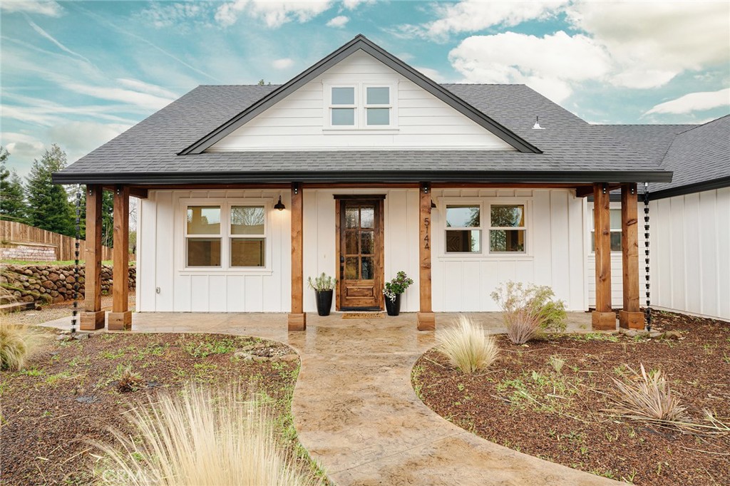 5144 Foster Road Paradise, CA 95969 - Photo 1 of 1 a front view of a house with a yard