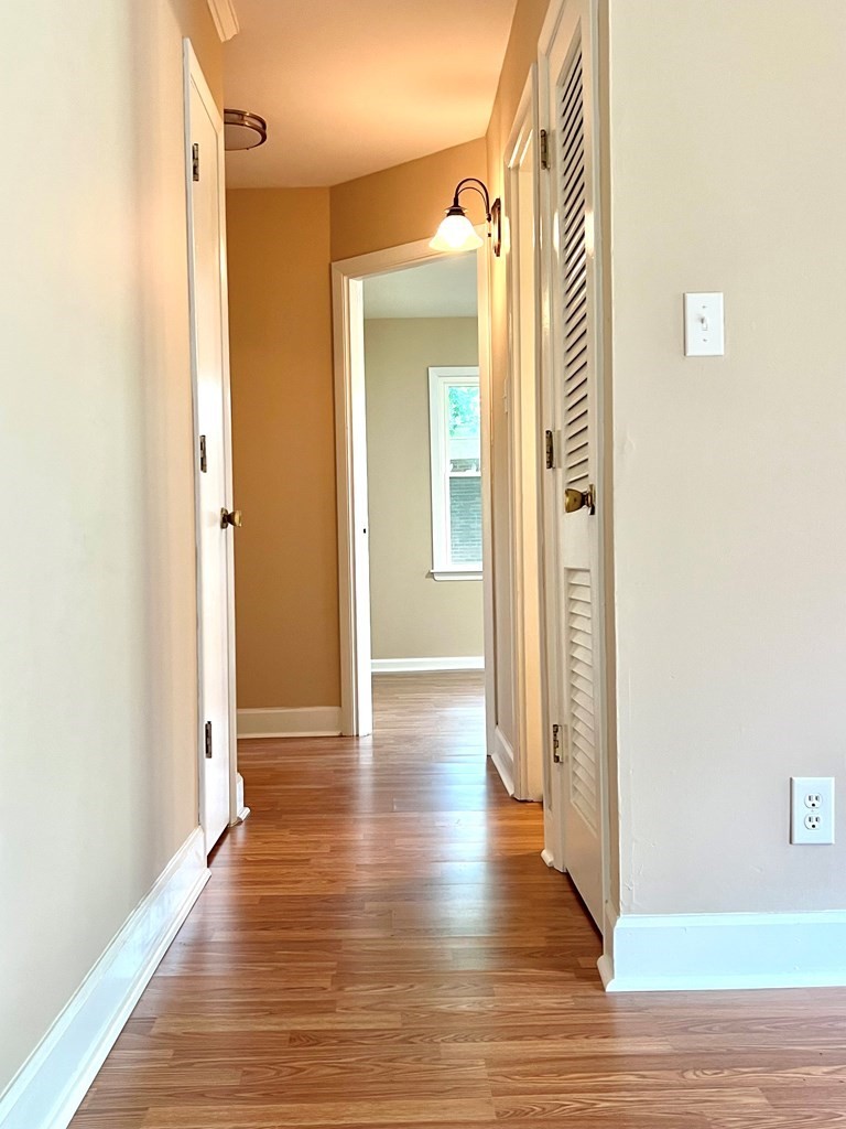 210 Roney Drive Hopkinsville, KY 42240 - Photo 13 of 29 a view of a hallway with wooden floor