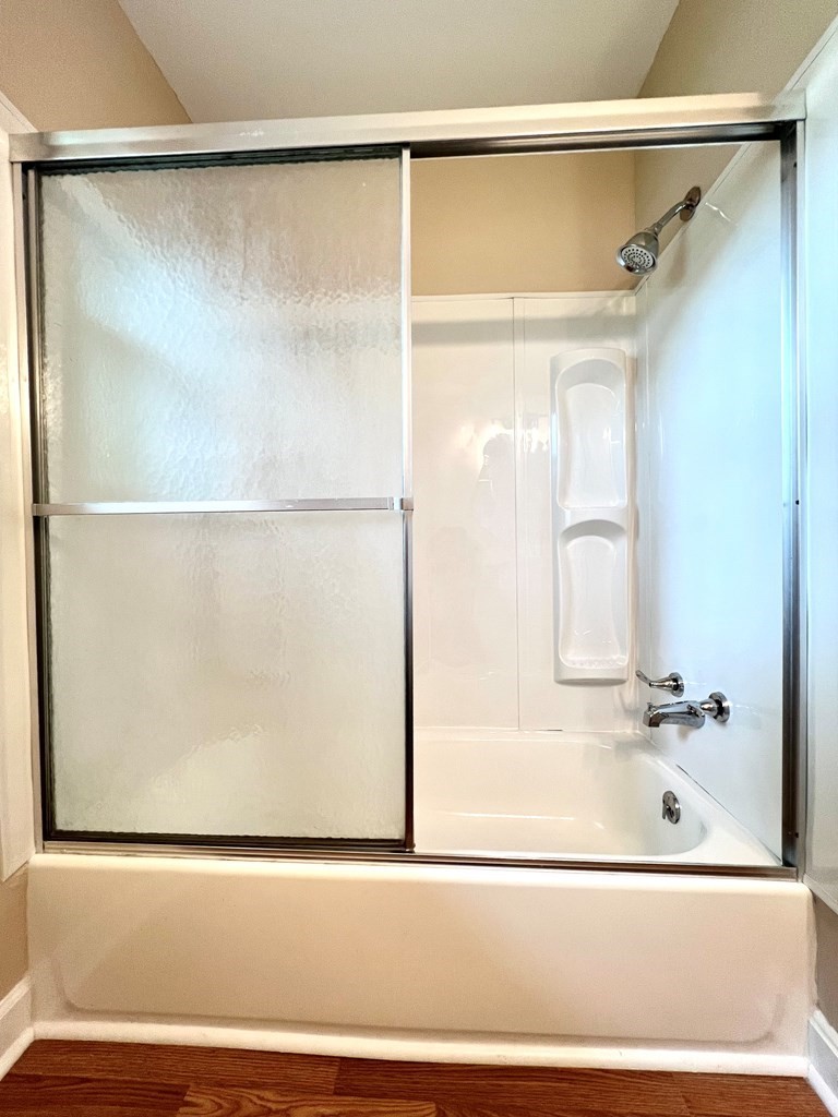 210 Roney Drive Hopkinsville, KY 42240 - Photo 23 of 29 a bathroom with a bathtub and a shower