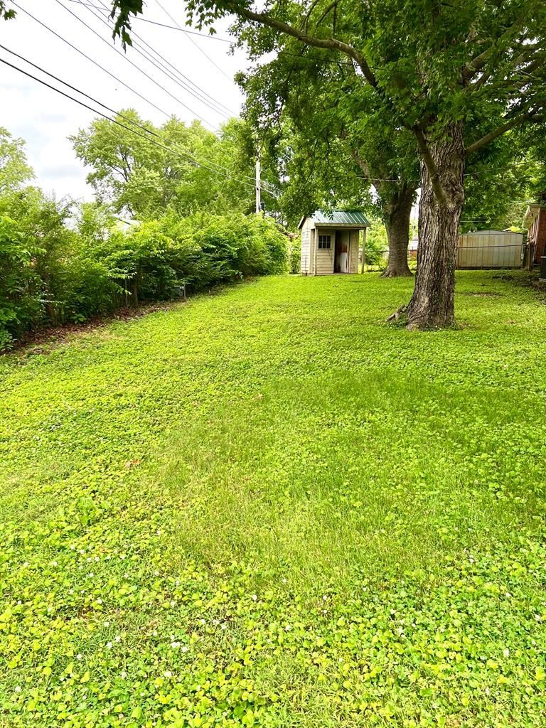 210 Roney Drive Hopkinsville, KY 42240 - Photo 29 of 29 a front view of a house with garden