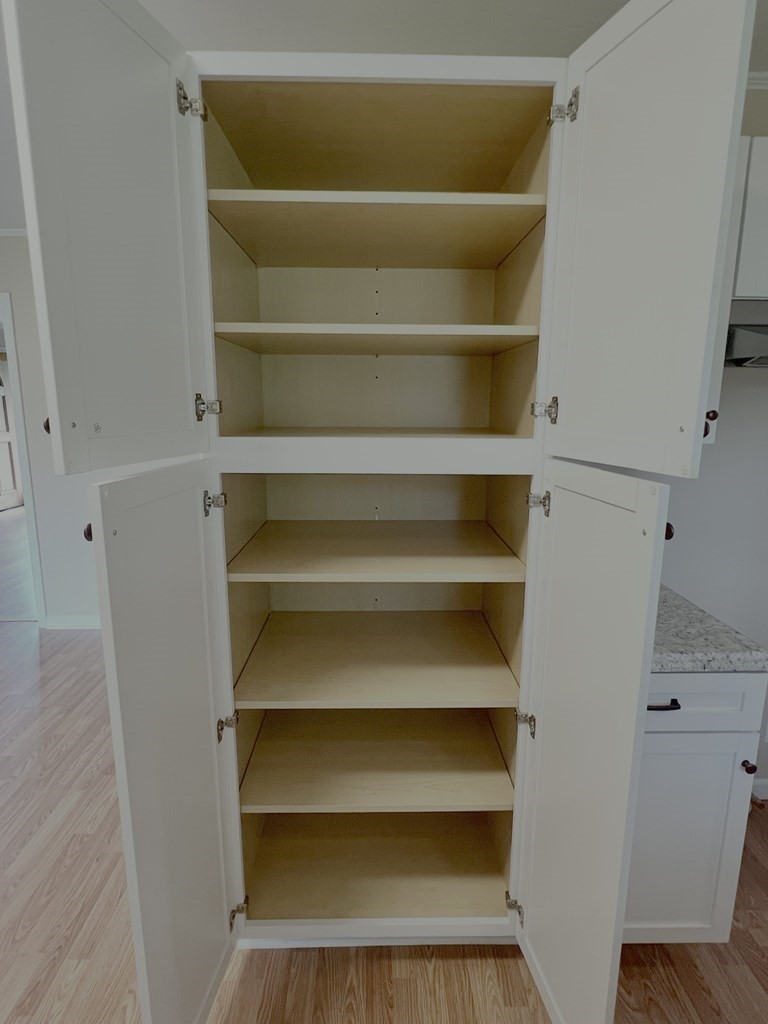 210 Roney Drive Hopkinsville, KY 42240 - Photo 8 of 29 a view of walk in closet with empty racks