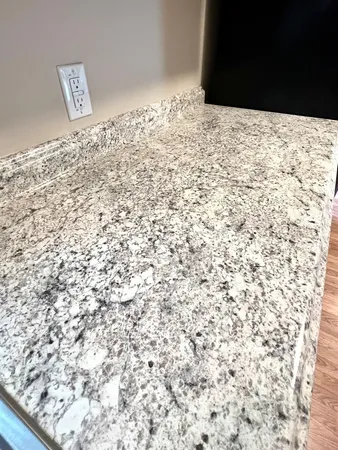 a view of wooden floor and a sink
