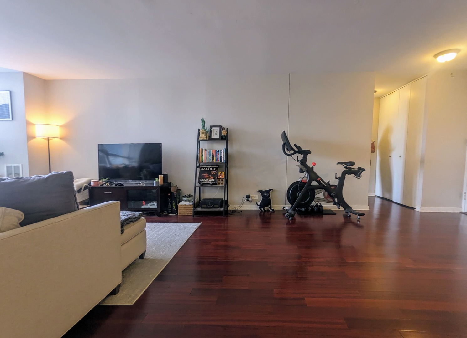 655 West Irving Park Road, Unit 508 Chicago, IL 60613 - Photo 11 of 15 a living room with furniture and a flat screen tv