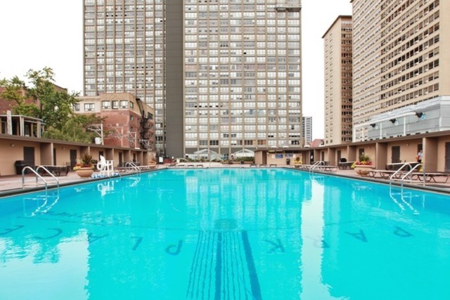 655 West Irving Park Road, Unit 508 Chicago, IL 60613 - Photo 4 of 15 a swimming pool with outdoor view
