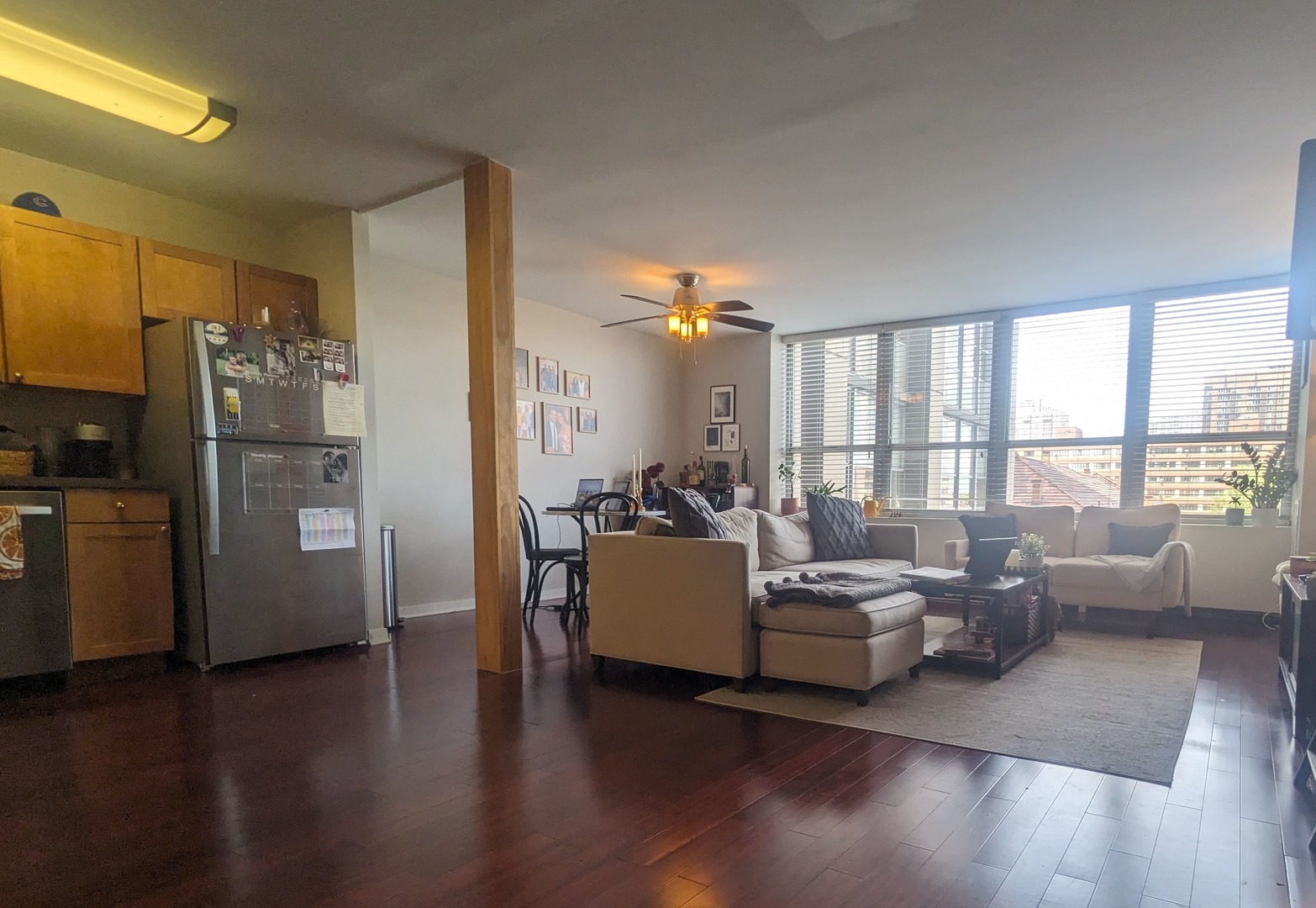 655 West Irving Park Road, Unit 508 Chicago, IL 60613 - Photo 8 of 15 a living room with furniture and a large window