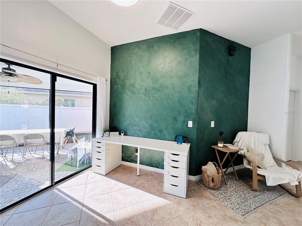 3840 Marietta Way St. Cloud, FL 34772 - Photo 21 of 44 a spacious bedroom with a bed and a window