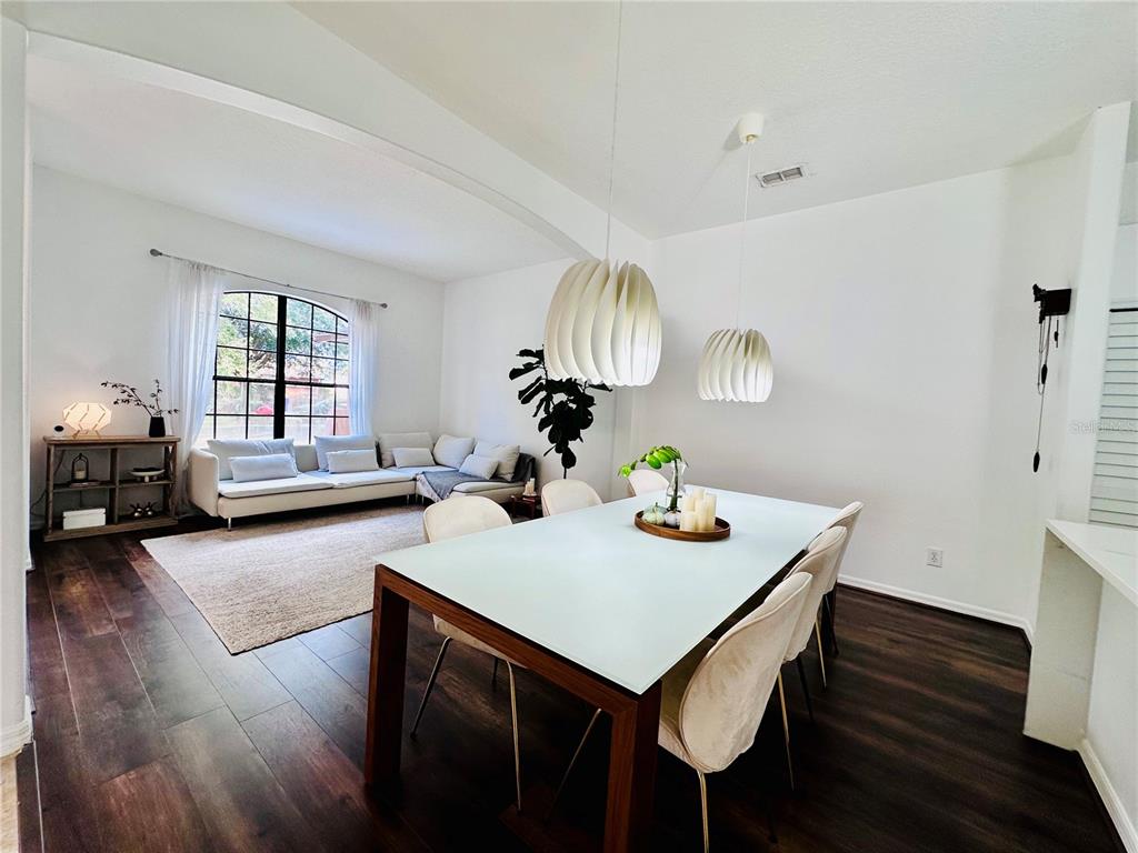 3840 Marietta Way St. Cloud, FL 34772 - Photo 35 of 44 a view of a dining room with furniture and window