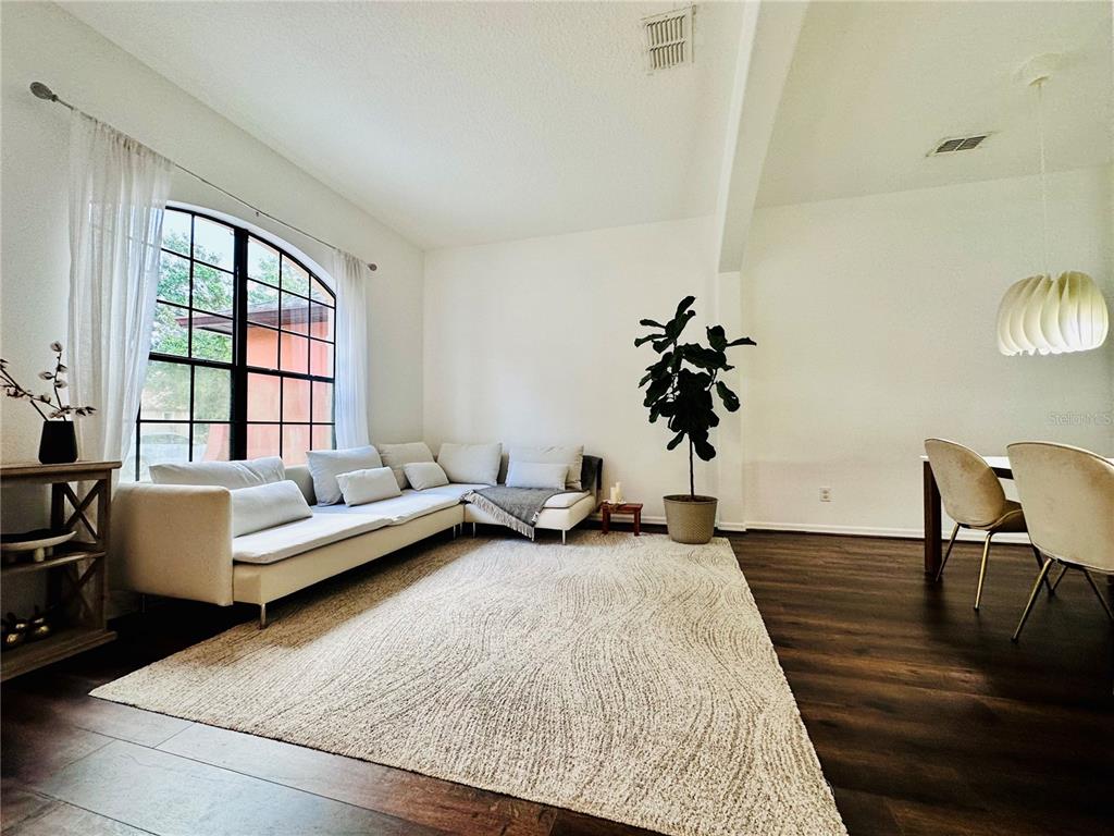 3840 Marietta Way St. Cloud, FL 34772 - Photo 36 of 44 a living room with furniture and wooden floor