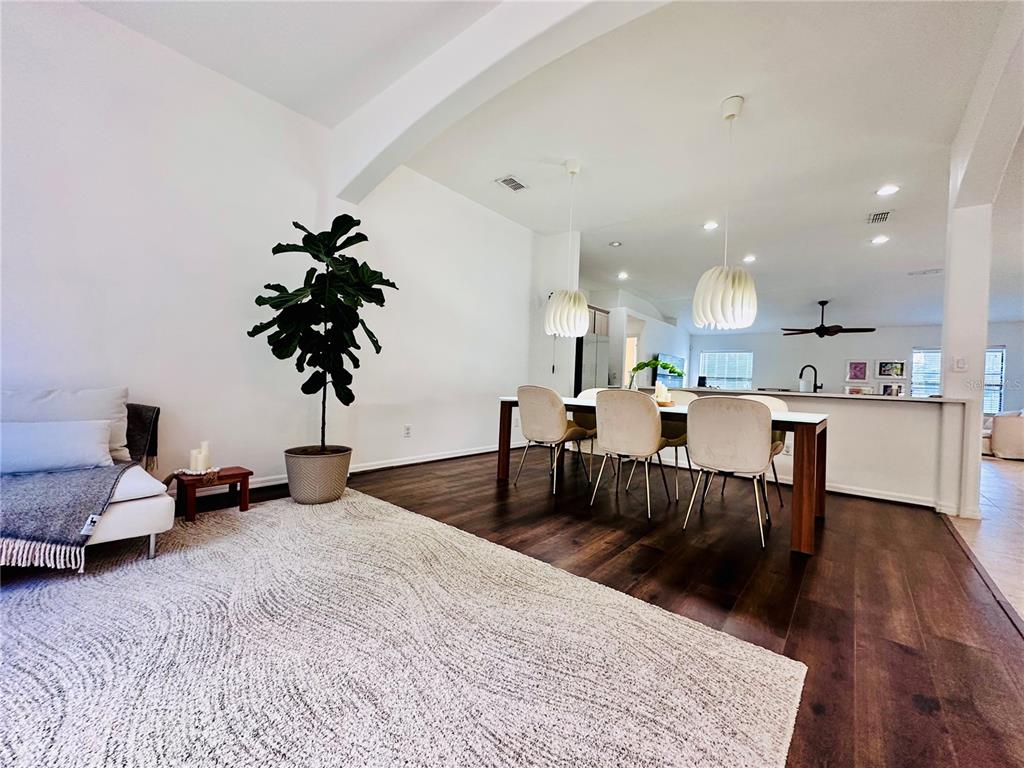 3840 Marietta Way St. Cloud, FL 34772 - Photo 41 of 44 a living room with furniture and a potted plant