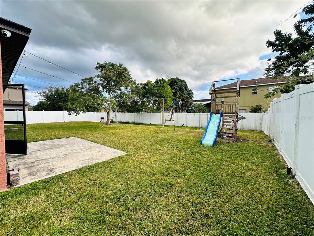 3840 Marietta Way St. Cloud, FL 34772 - Photo 42 of 44 a view of a playground with basketball court