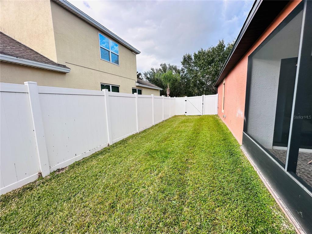 3840 Marietta Way St. Cloud, FL 34772 - Photo 44 of 44 a view of back yard of the house