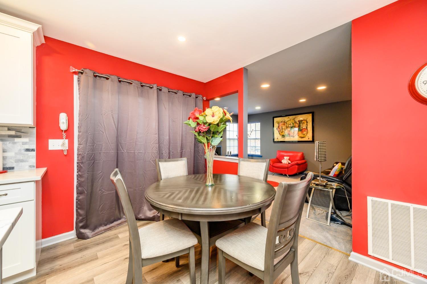 1 Rutgers Drive Howell, NJ 07731 - Photo 15 of 43 a view of a dining room with furniture and a potted plant