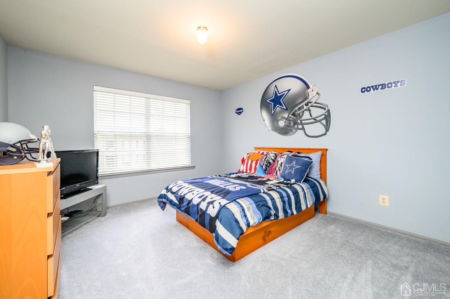 1 Rutgers Drive Howell, NJ 07731 - Photo 20 of 43 a bedroom with a bed and a window