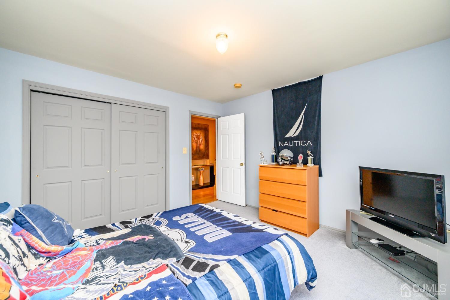 1 Rutgers Drive Howell, NJ 07731 - Photo 21 of 43 a bedroom with a bed and furniture