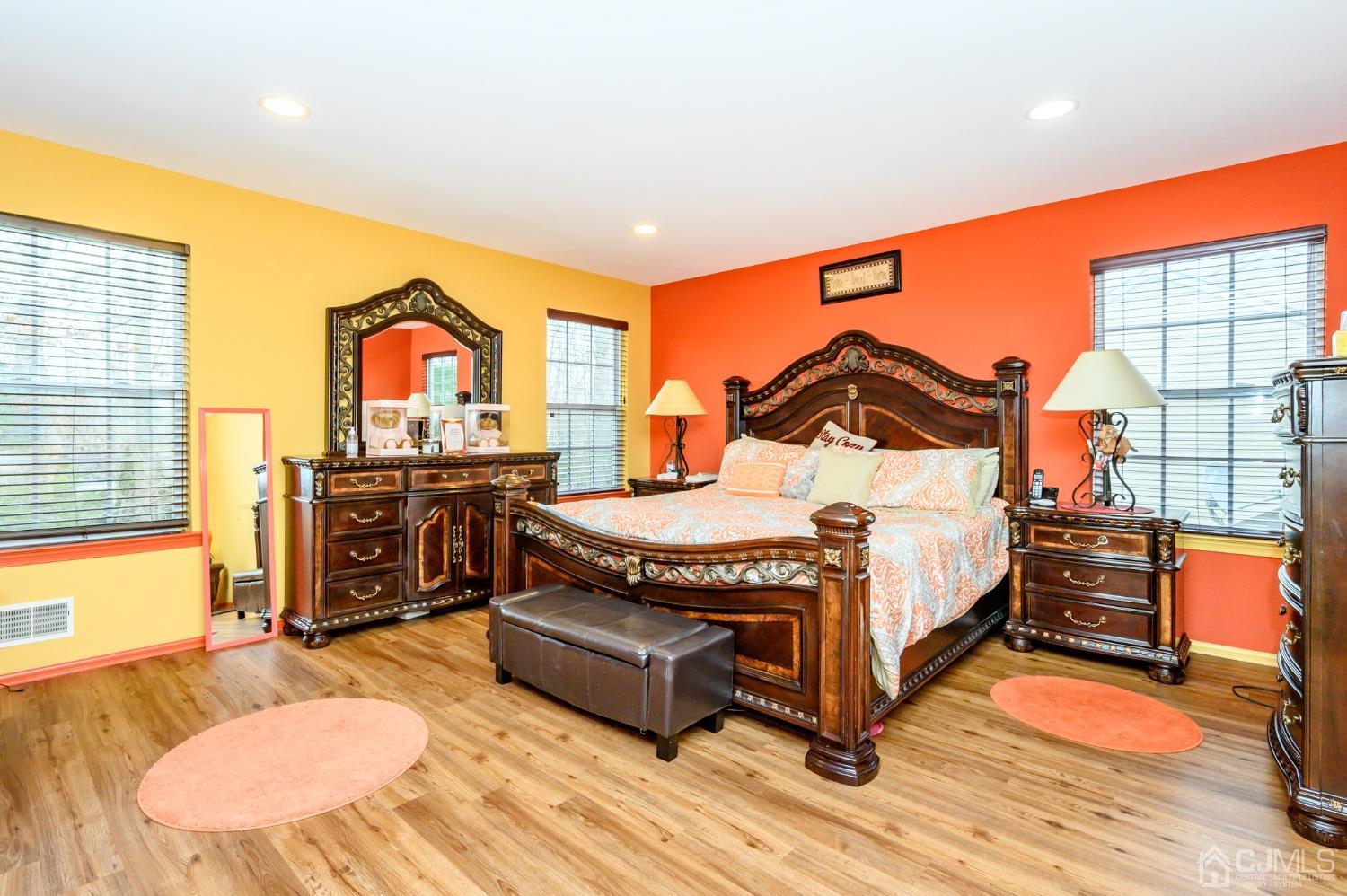 1 Rutgers Drive Howell, NJ 07731 - Photo 28 of 43 a bedroom with a bed and wooden floor