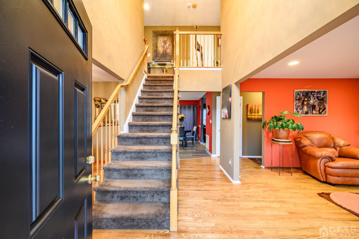 1 Rutgers Drive Howell, NJ 07731 - Photo 3 of 43 a view of entryway and hall with wooden floor