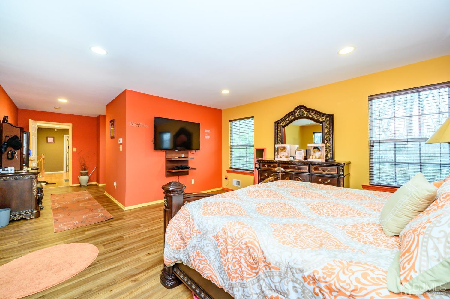 1 Rutgers Drive Howell, NJ 07731 - Photo 31 of 43 a bedroom with a bed and wooden floor