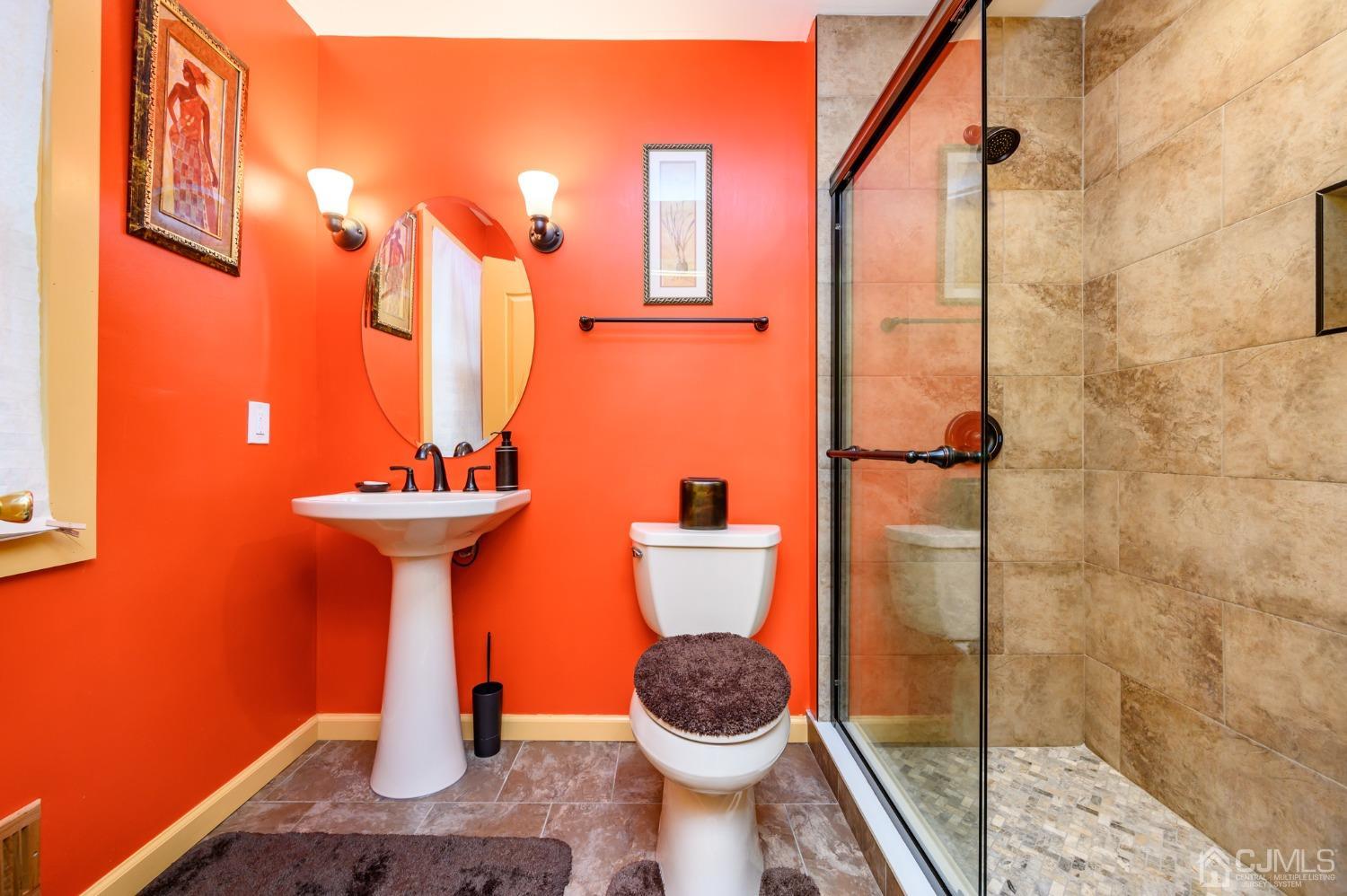 1 Rutgers Drive Howell, NJ 07731 - Photo 32 of 43 a bathroom with a sink and toilet