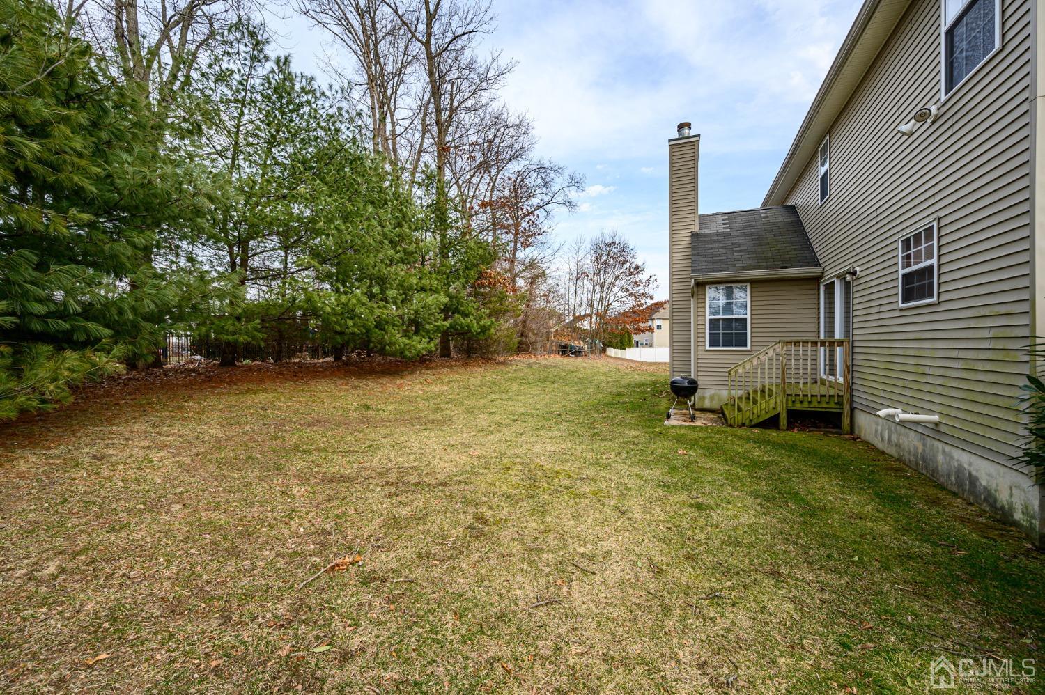 1 Rutgers Drive Howell, NJ 07731 - Photo 39 of 43 a view of a house with a backyard