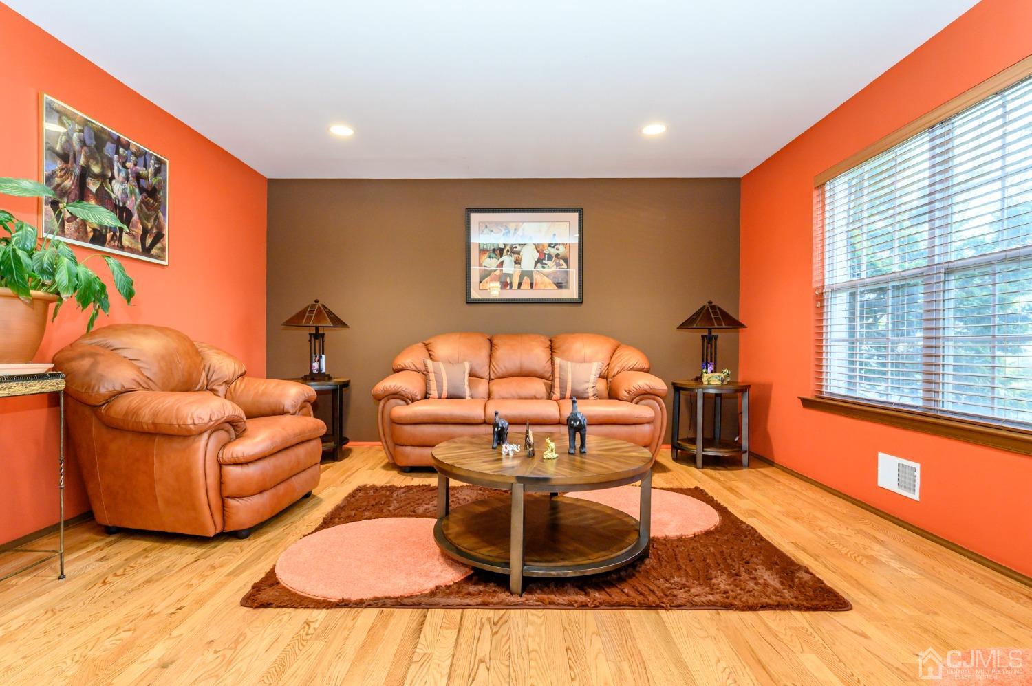 1 Rutgers Drive Howell, NJ 07731 - Photo 4 of 43 a living room with furniture and a flat screen tv