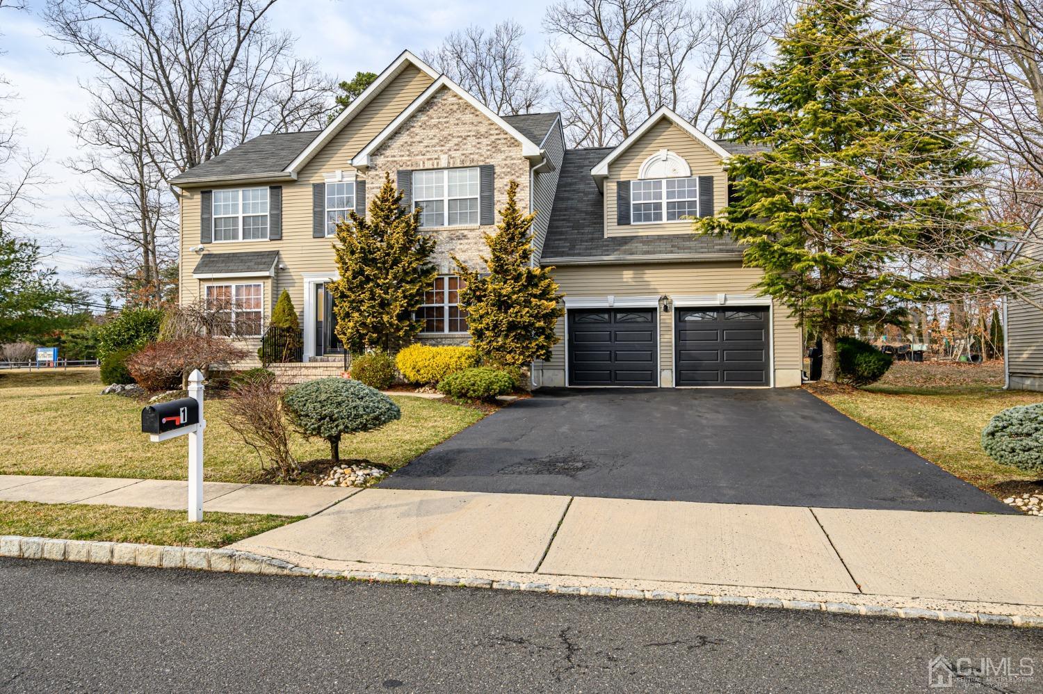 1 Rutgers Drive Howell, NJ 07731 - Photo 43 of 43 a front view of a house with garden